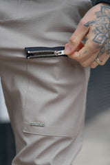 NIXON CARGO TROUSERS - GREIGE